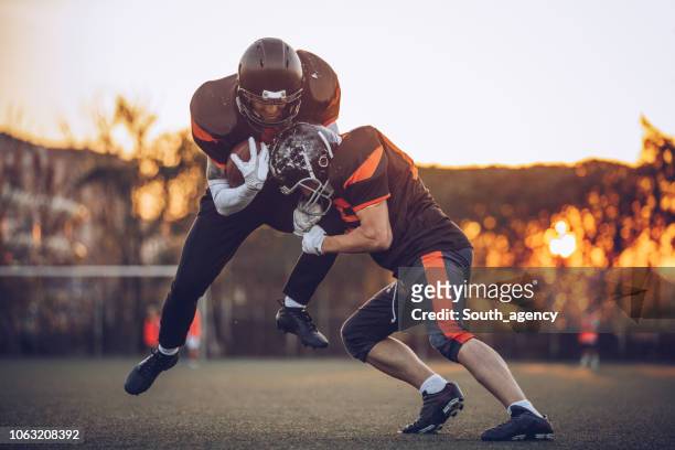 winning match - tackling stock pictures, royalty-free photos & images