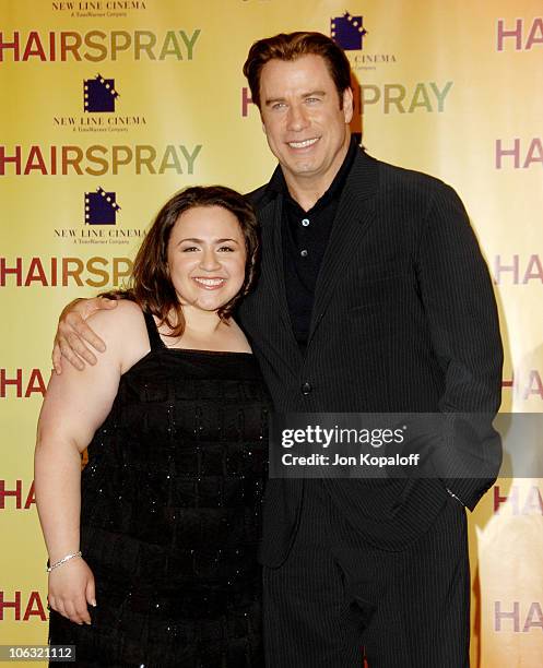 Nikki Blonsky and John Travolta during ShoWest 2007 - "Hairspray" Photo Call at Paris Hotel in Las Vegas, Nevada, United States.