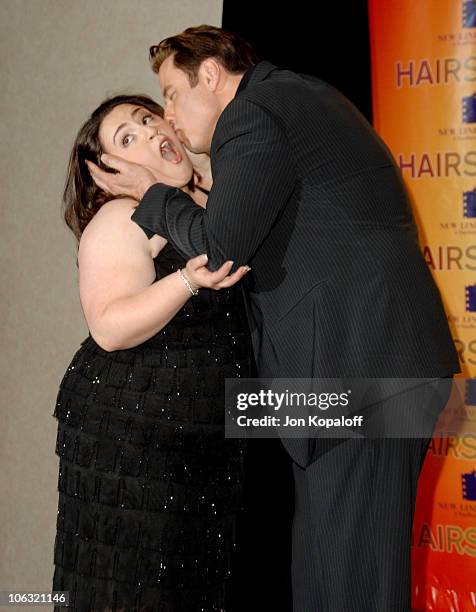 Nikki Blonsky and John Travolta during ShoWest 2007 - "Hairspray" Photo Call at Paris Hotel in Las Vegas, Nevada, United States.