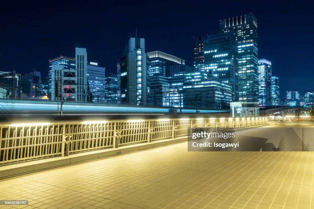 Nightscape Of Tokyo City And Train Light Trails