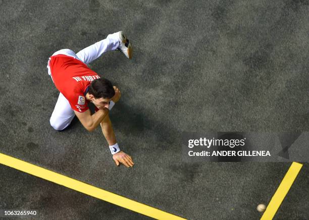 Altuna III returns the ball during the Euskolabel eusko pilota 4 1/2 championship final match between Altuna III and Ezkurdia at the Navarra arena in...