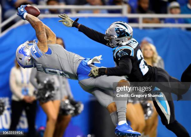 Kenny Golladay of the Detroit Lions catches a touchdown pass against James Bradberry of the Carolina Panthers during the fourth quarterof the Detroit...