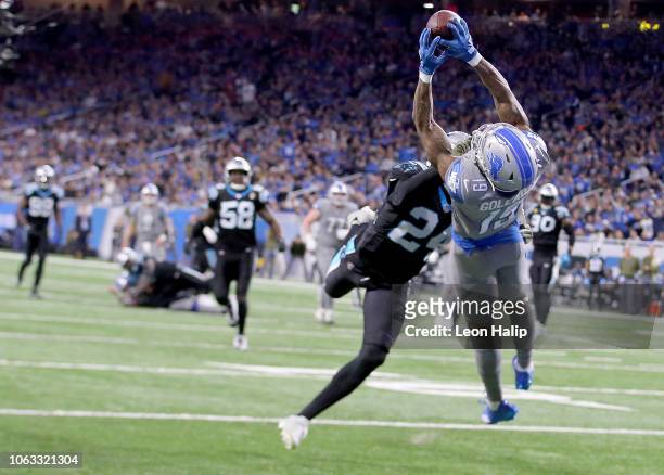 Kenny Golladay of the Detroit Lions makes a diving catch against James Bradberry of the Carolina Panthers during the fourth quarter at Ford Field on...
