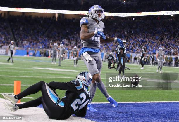 Kenny Golladay of the Detroit Lions celebrates his touchdown catch against James Bradberry of the Carolina Panthers during the fourth quarter at Ford...