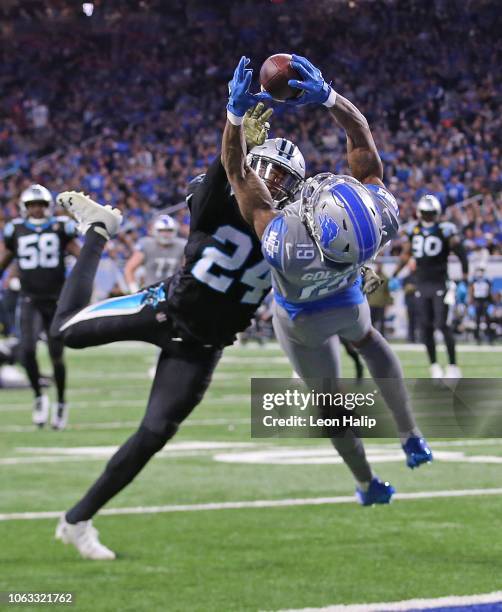 Kenny Golladay of the Detroit Lions makes a diving catch against James Bradberry of the Carolina Panthers during the fourth quarter at Ford Field on...