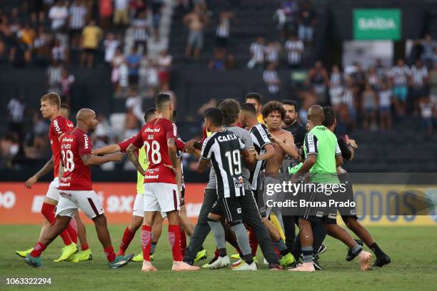 Players of Botafogo and Internacional argue during a match between Botafogo and Internacional as part of Brasileirao Series A 2018 at Engenhao...