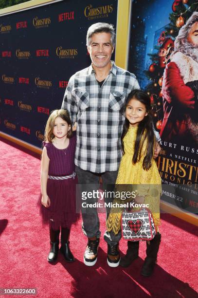 Esai Morales and Mariana Oliveira Morales attend "The Christmas Chronicles" Premiere on November 12, 2018 in Los Angeles, California.