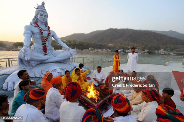 Aarti Ceremony near Ganges River, Hindu ritual, in which light from wicks soaked in ghee or camphor is offered to one or more deities, at the ashram...