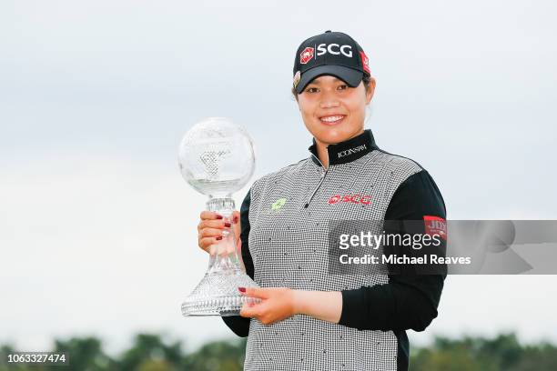 Ariya Jutanugarn of Thailand poses for a photo with the Race to the CME Globe trophy after the final round of the LPGA CME Group Tour Championship at...