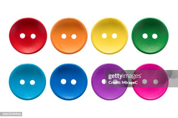 rainbow colored buttons - multi coloured buttons stock pictures, royalty-free photos & images