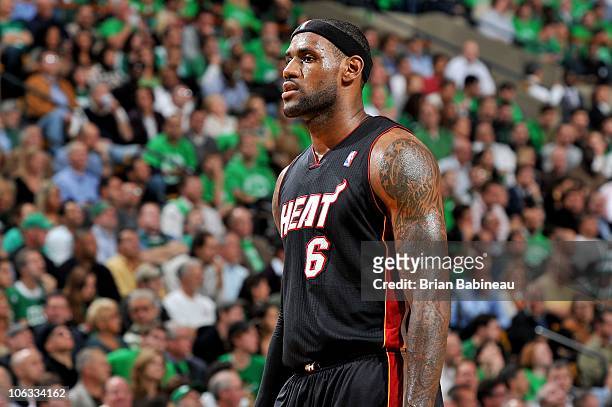 LeBron James of the Miami Heat stands on the court during the season opening game against the Boston Celtics on October 26, 2010 at the TD Garden in...