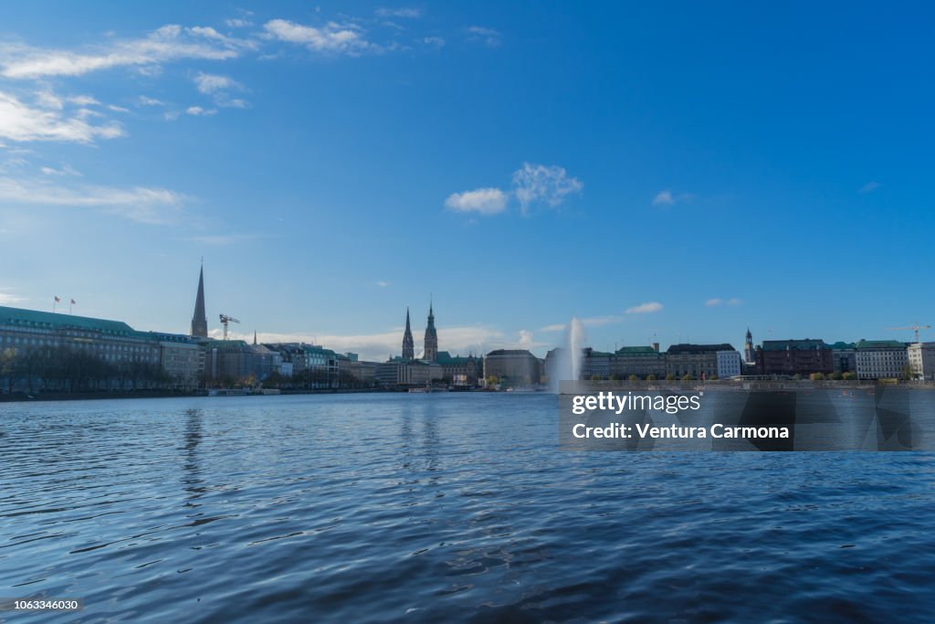 Lake Binnenalster with the Alster fountain in Hamburg - Germany