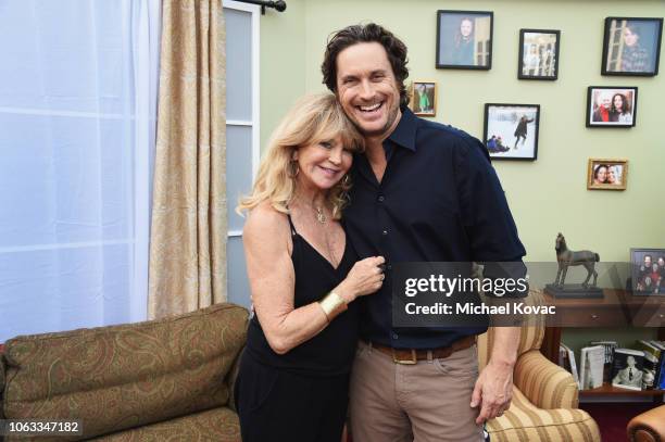 Oliver Hudson and Goldie Hawn attend "The Christmas Chronicles" Premiere on November 12, 2018 in Los Angeles, California.