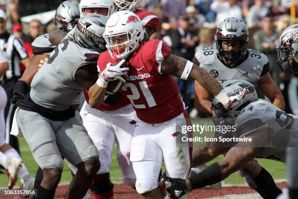 Arkansas Razorbacks running back Devwah Whaley carries the ball in the game between the Arkansas Razorbacks and the Mississippi State Bulldogs on...