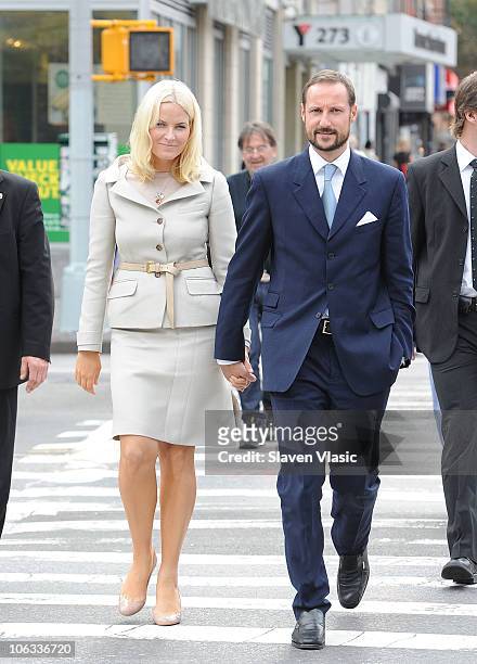 Crown Princess Mette-Marit and Crown Prince Haakon of Norway walk the streets in Downtown Manhattan on October 28, 2010 in New York City.