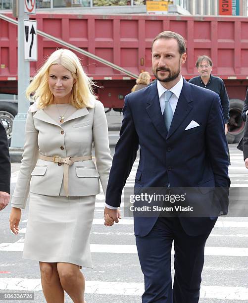 Crown Princess Mette-Marit and Crown Prince Haakon of Norway walk the streets in Downtown Manhattan on October 28, 2010 in New York City.