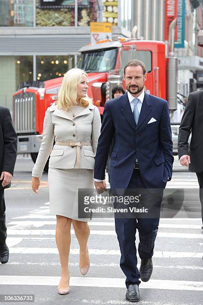 Crown Princess Mette-Marit and Crown Prince Haakon of Norway walk the streets in Downtown Manhattan on October 28, 2010 in New York City.