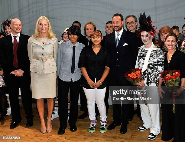 Crown Princess Mette-Marit and Crown Prince Haakon of Norway pose with actors and creative team behind the children's opera "Max and Moritz" at the...