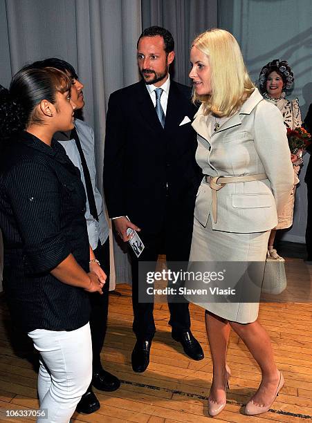 Crown Prince Haakon and Crown Princess Mette-Marit of Norway talk to the students at the Lower Manhattan Arts Academy on October 28, 2010 in New York...