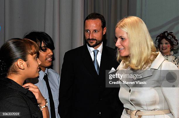 Crown Prince Haakon and Crown Princess Mette-Marit of Norway talk to the students at the Lower Manhattan Arts Academy on October 28, 2010 in New York...