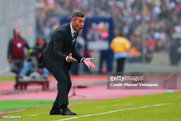 Pedro Caixinha coach of Cruz Azul gives instructions to his players during a 15th round match between Pumas UNAM and Cruz Azul as part of Torneo...