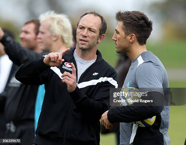 Saracens director of rugby Brendan Venter talks to new signing, Gavin Henson, during the training session at Saracens training ground on October 28,...