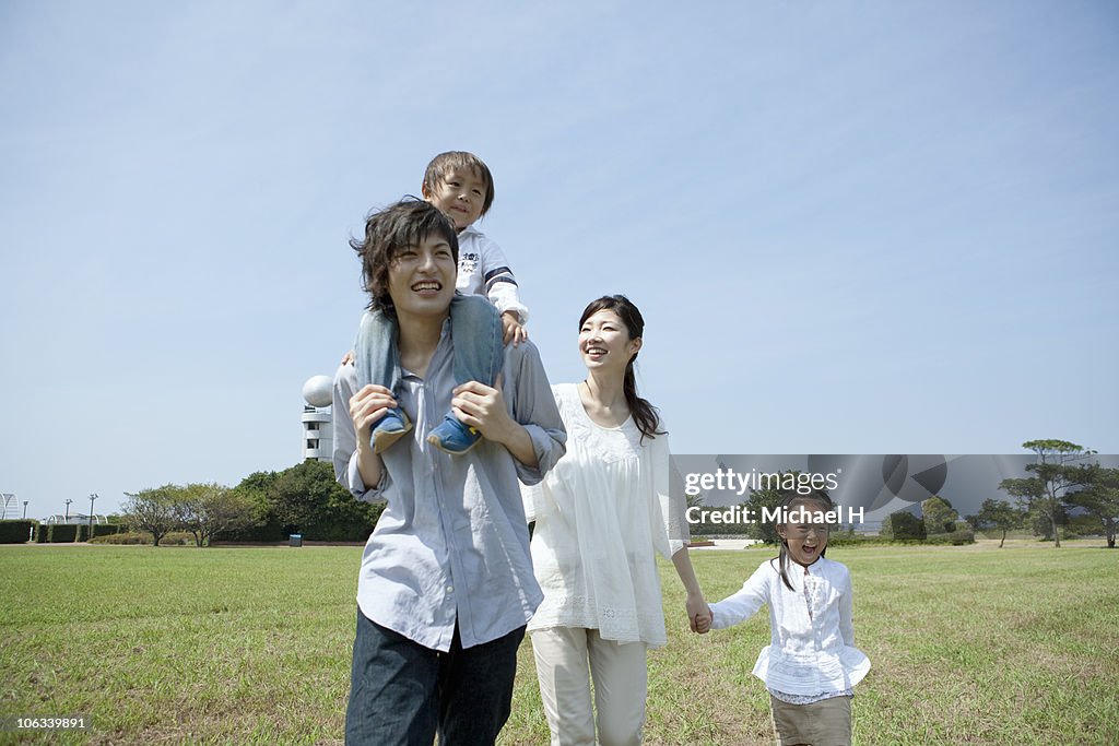 Family who takes a turn in the park