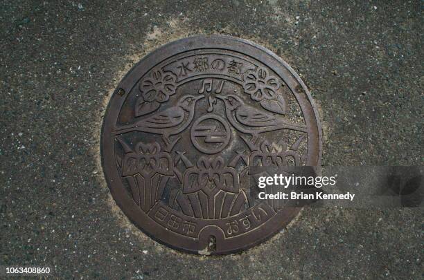 hita city manhole cover - マンホール ストックフォトと画像