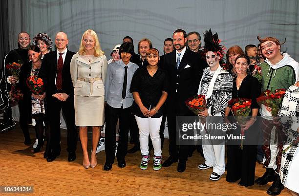 Crown Princess Mette-Marit and Crown Prince Haakon of Norway pose with actors and creative team behind the children's opera "Max and Moritz" at the...