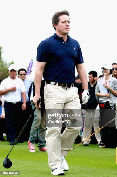 Hollywood actor Hugh Grant of Great Britain participates in the Mission Hills Star Trophy at the Blackstone Course on October 28, 2010 in Haikou,...