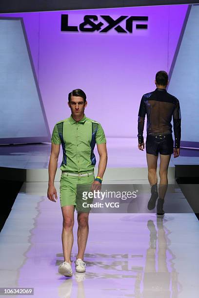 Models walk the runway during LXF collection show on the sixth day of China Fashion Week Spring/Summer 2011 on October 28, 2010 in Beijing, China.