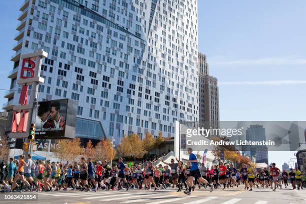 Runners in New York City's marathon pass through the neighborhoods in Brooklyn on November 4, 2018 in the Brooklyn borough of New York City.