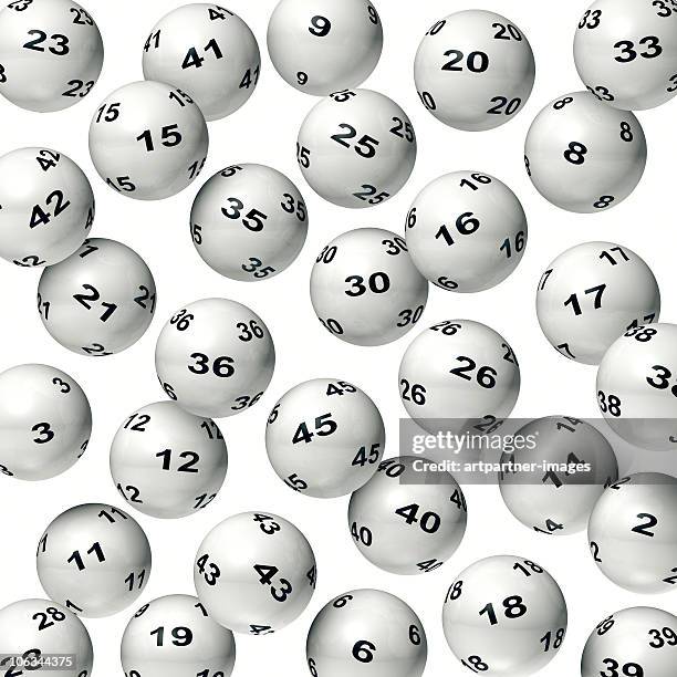 falling lottery balls on white background - lotto stock-fotos und bilder