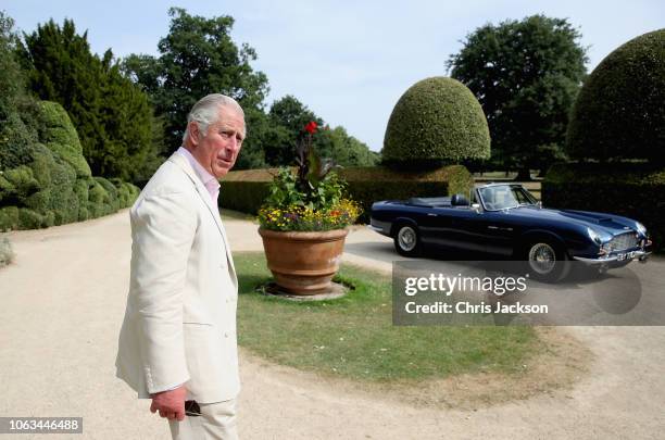 Prince Charles, Prince of Wales with his Aston Martin DB6 Volante at Highgrove House on July 2018 in Tetbury, United Kingdom.