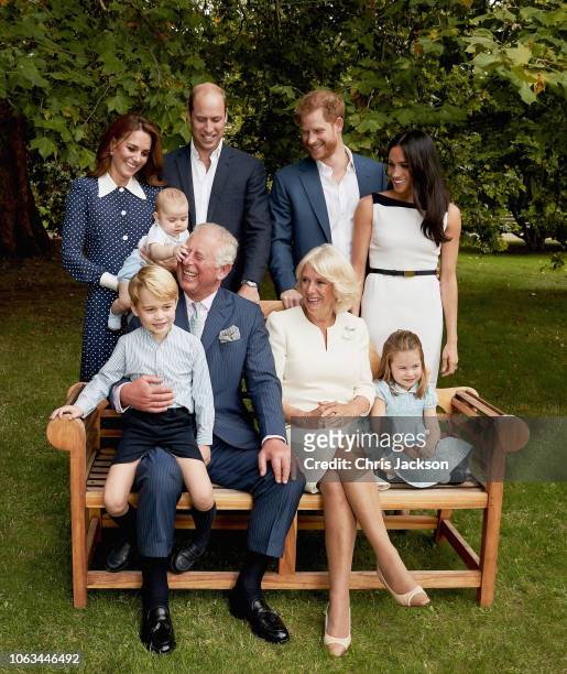 Prince Charles, Prince of Wales with Prince Louis of Cambridge and Catherine, Duchess of Cambridge after a famil portrait photo-shoot in the gardens...