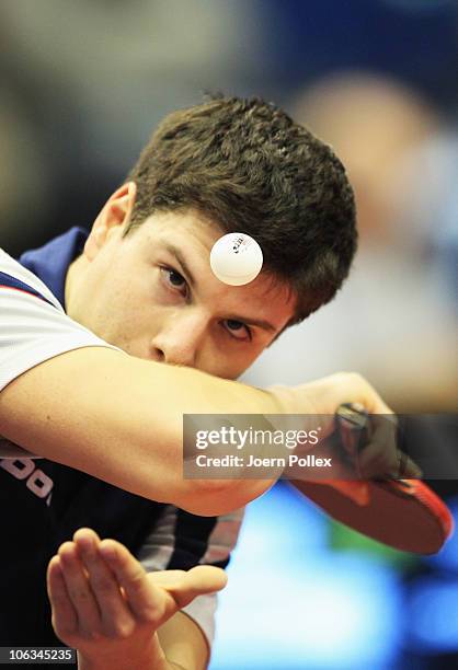 Dimitrij Ovtcharov of Germany serves to Kalinikos Kreanga of Greece during their Table Tennis World Cup 2010 match at the Boerdeland Hall on October...
