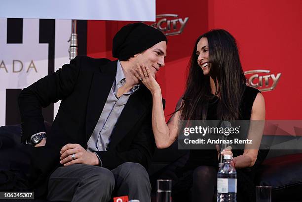 Demi Moore and Ashton Kutcher attend the photo call for their Charity Gala at PlusCity on October 29, 2010 in Pasching near Linz, Austria.