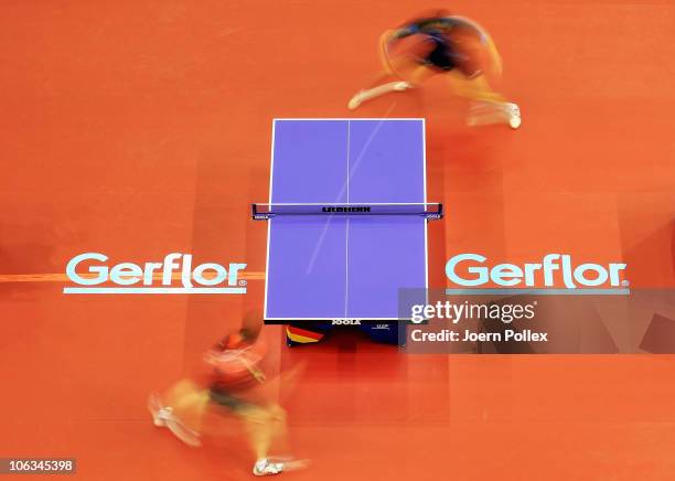 Werner Schlager of Austria and Vladimir Samsonov of Belarus compete during their Table Tennis World Cup 2010 match at the Boerdeland Hall on October...
