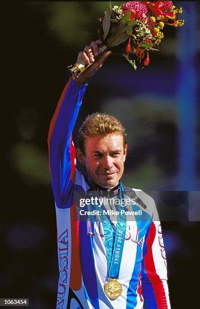 Viacheslav Ekimov of Russia celebrates gold in the Mens Road Cycling Individual Time Trial at Moore Park on day 15 of the Sydney 2000 Olympic Games...