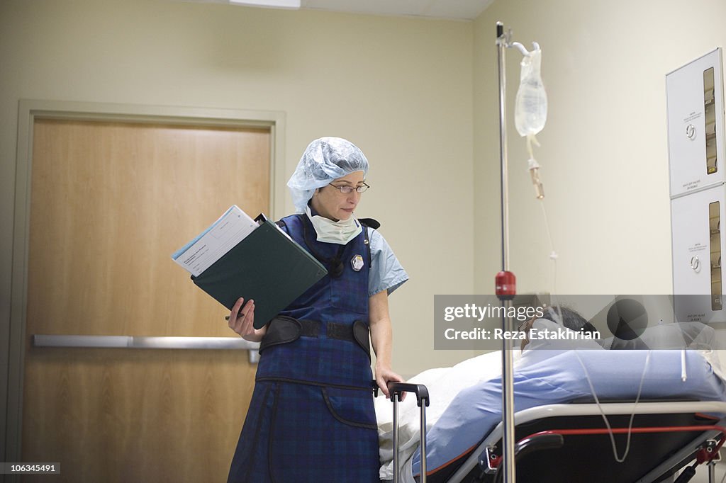 Doctor talks to patient prior to surgery