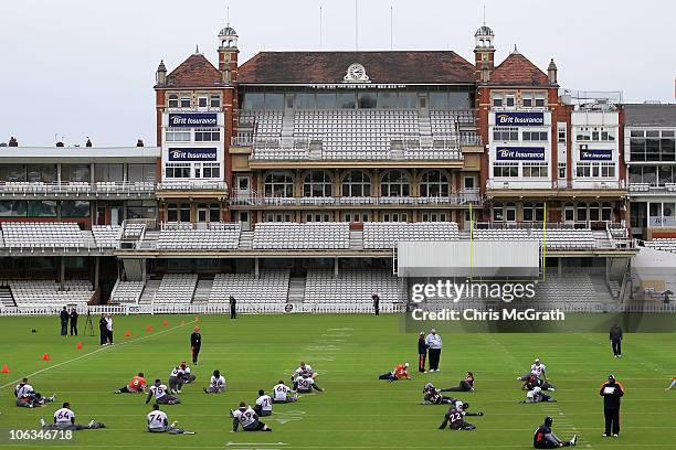 Players from the Denver Broncos warm up during a team training session at The Brit Oval on October 29, 2010 in London, England. The Denver Broncos...