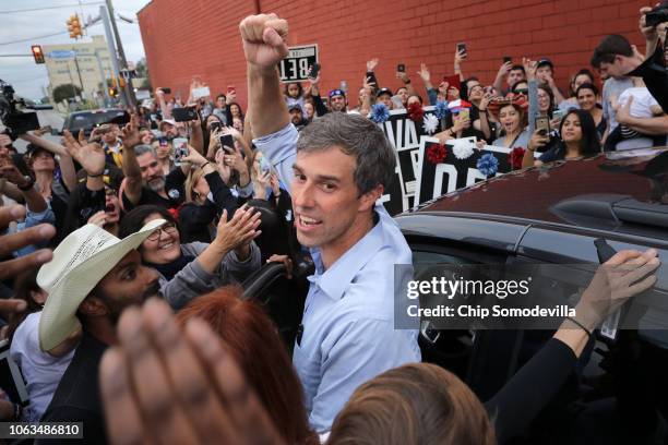 Senate candidate Rep. Beto O'Rourke pumps his fist for a cheering crowd before departing a campaign rally at the Alamo City Music Hall November 04,...