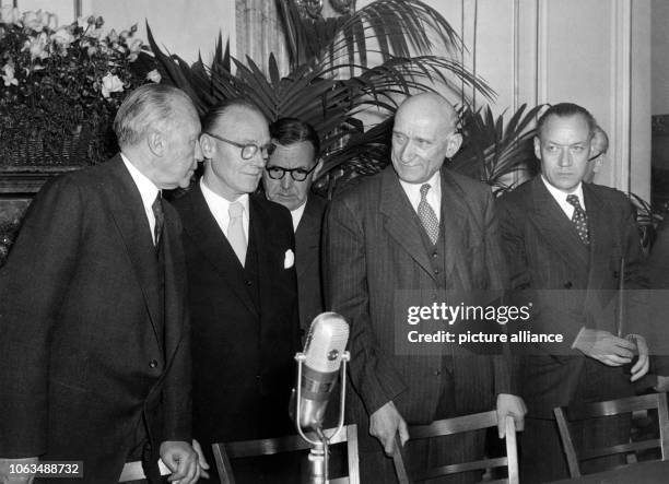 German chancellor Konrad Adenauer, state secretary Ludger Westrick, unknown, the French foreign minister Robert Schuman and Jean-Marie Louvel on the...