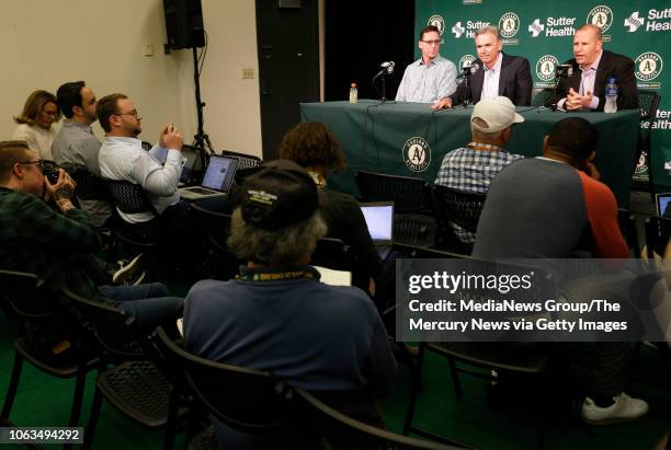 Oakland Athletics Manager Bob Melvin, Executive Vice President of Baseball Operations Billy Beane and General Manager David Forst, from left, answer...