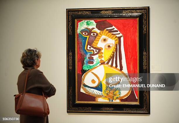 "Homme et Femme au Bouquet" by Pablo Picasso is on display during a press preview of Sotheby's Impressionist and Modern Art autumn sale in New York,...