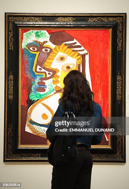 "Homme et Femme au Bouquet" by Pablo Picasso is on display during a press preview of Sotheby's Impressionist and Modern Art autumn sale in New York,...