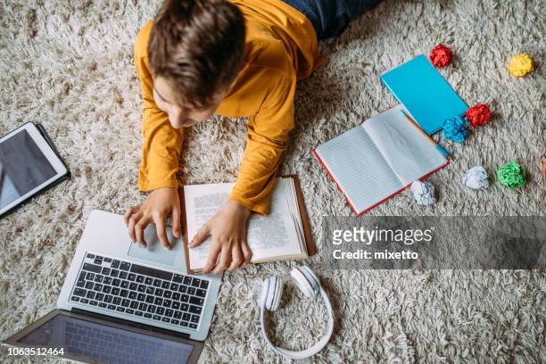 teen and homework - kid e learning stock pictures, royalty-free photos & images