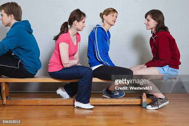 germany, berlin, people sitting in gym - gymnastics vault stock pictures, royalty-free photos & images