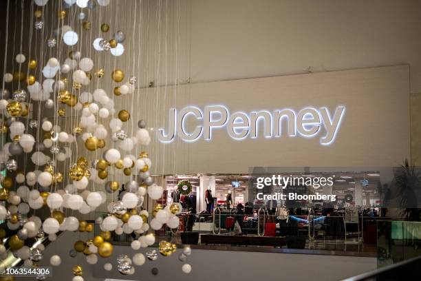 Christmas decorations are displayed near the entrance to a J.C. Penney store inside the Westfield Mall in Culver City, California, U.S., on Friday,...