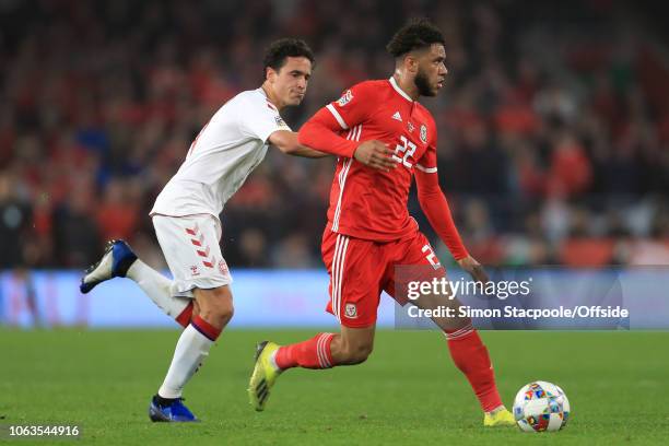 Tyler Roberts of Wales battles with Thomas Delaney of Denmark during the UEFA Nations League B Group Four match between Wales and Denmark at Cardiff...